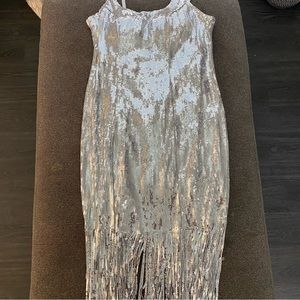 Silver Sequin fringe dress. Lots a stretch. Adjustable straps. Brand New.